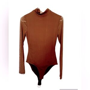 Bodysuit top Sz.Med Chocolate snap bodysuit. NWOT Could fit a small as well.